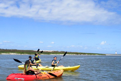 Enjoy the Cockspur Lighthouse Tour from Aqua Dawg Kayak Company at Tybee Island, Georgia, which is available for free at Xplorie participating properties.
