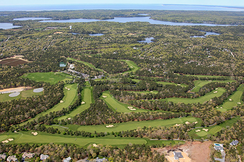 An aerial view of the beautiful Cranberry Valley Golf Course in Harwich, Massachusetts, where guests staying at Xplorie participating properties can enjoy one complimentary round of eighteen hole golf with golf cart.