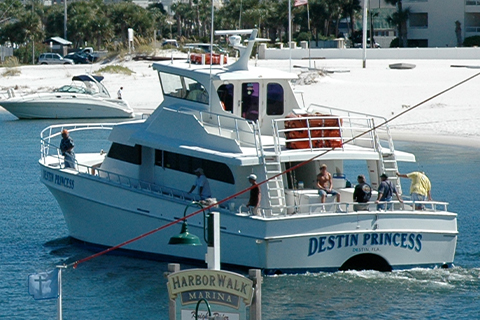The Destin Princess boat takes off from the harbor in Destin, Florida for another exciting fishing adventure, which is available for free at Xplorie participating properties.