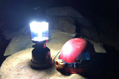 A view of a lamp and head lamp in Worley's Cave in Elizabethton, Tennessee, where guests staying at Xplorie participating properties can enjoy a free admission from River & Earth Adventures.