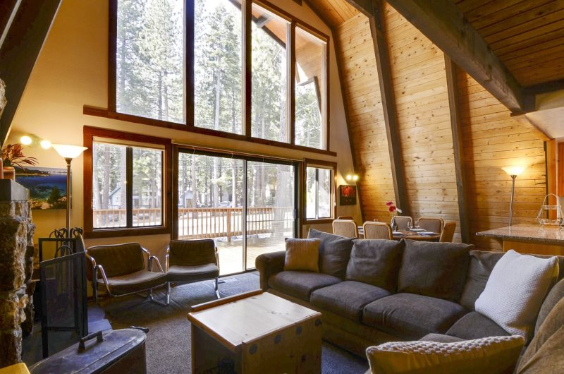 Stay In Lake Tahoe Rentals cabin living room with high ceiling in Lake Tahoe, California
